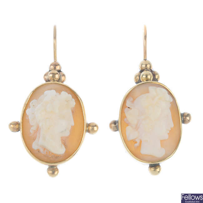 A pair of early 20th century 9ct gold shell cameo ear pendants.