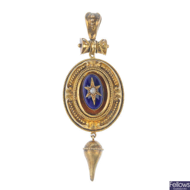A late Victorian gold plated and enamel pendant.