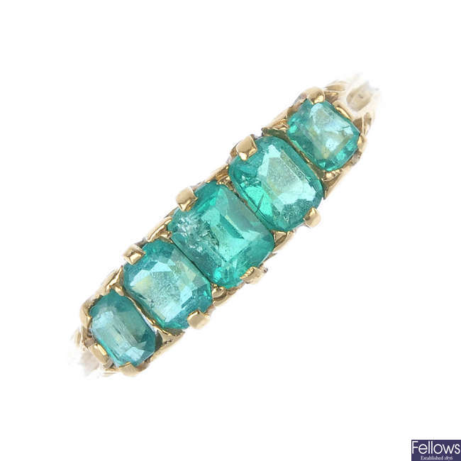 An early 20th century 15ct gold emerald five-stone ring.