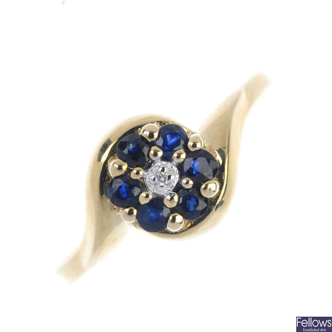 A 9ct gold diamond and sapphire cluster ring. 