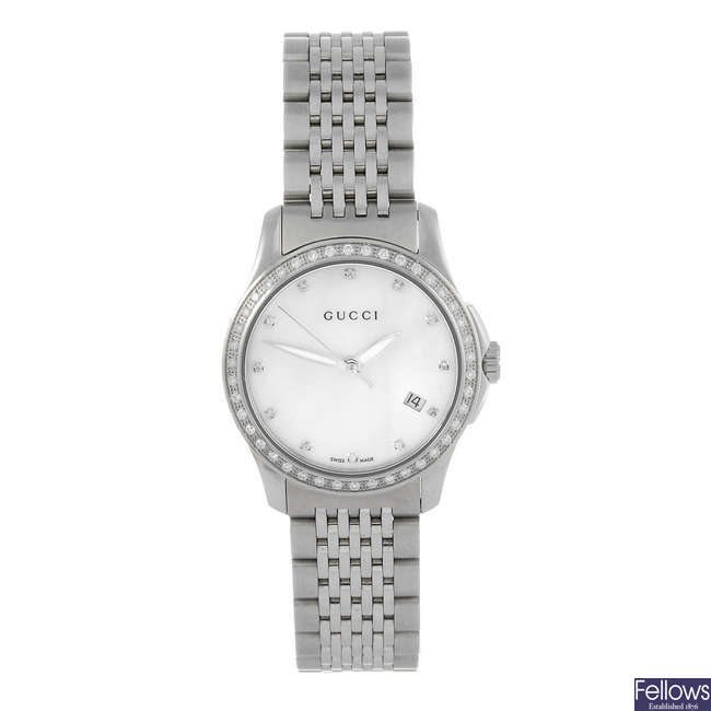 GUCCI - a lady's stainless steel 126.5 bracelet watch.