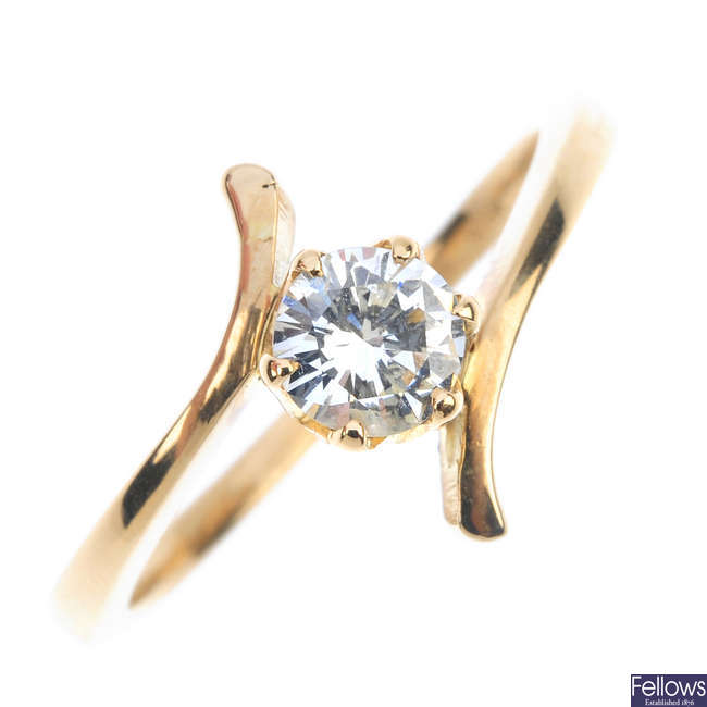 A 14ct gold diamond crossover ring. 