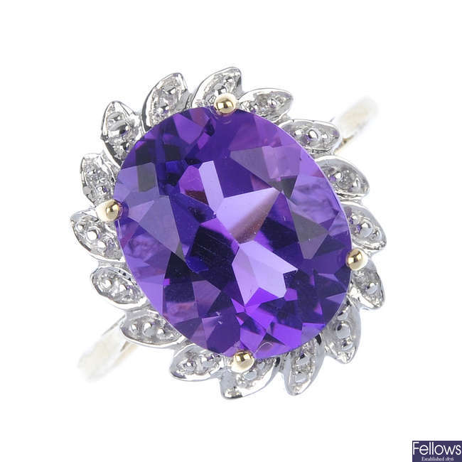 A 9ct gold amethyst and diamond floral cluster ring.