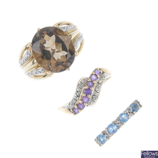 A selection of three 9ct gold diamond and gem-set dress rings. 