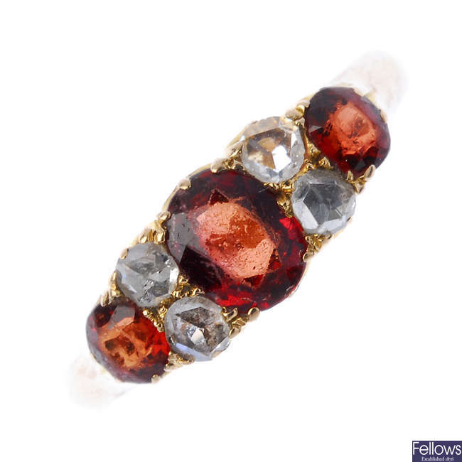 An early 20th century 15ct gold garnet and diamond ring.