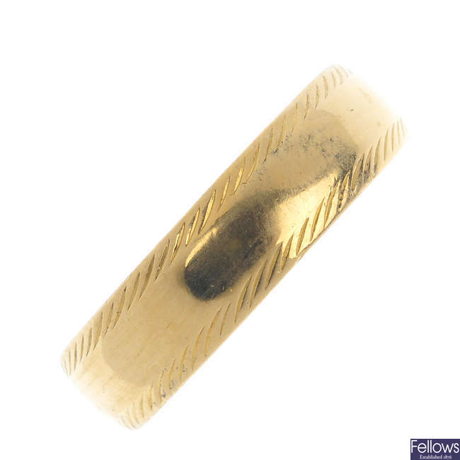 A 22ct gold band ring. 