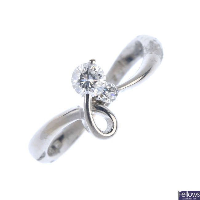 An 18ct diamond two-stone ring.