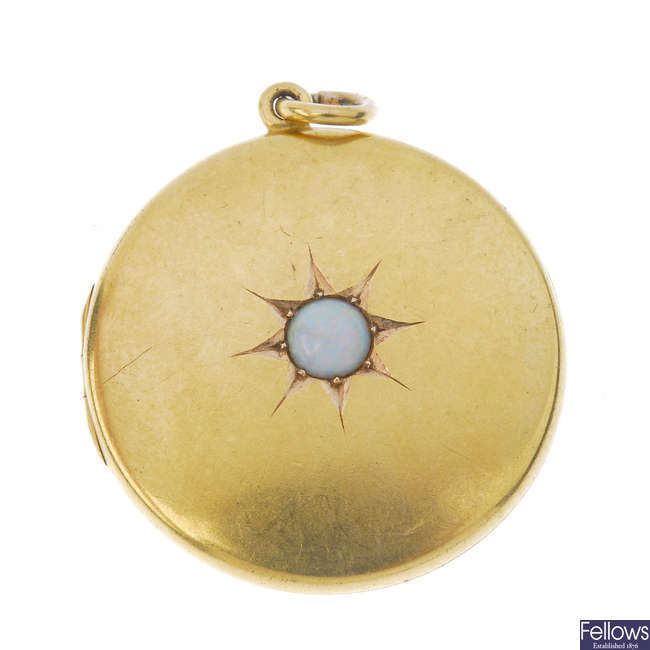 An early 20th century 15ct gold opal locket.