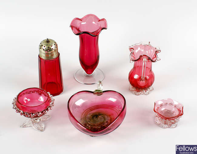 A group of cranberry and other glass