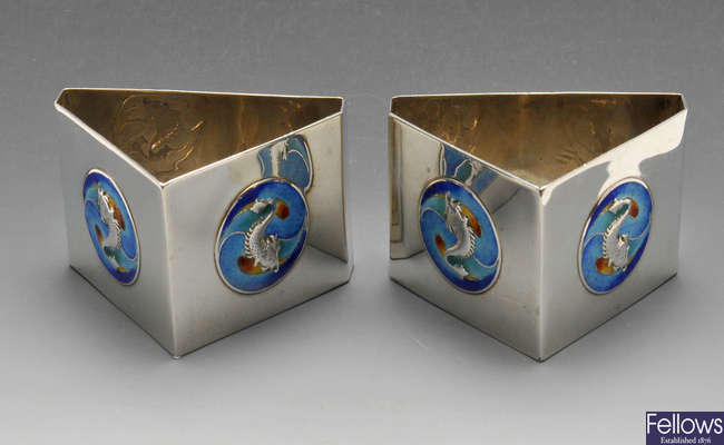 An Edwardian pair of silver & enamel napkin rings.