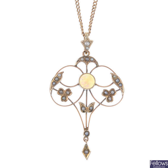 An early 20th century 9ct gold opal and pearl split pendant.