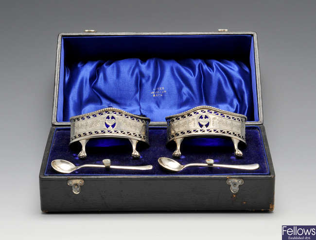 A cased pair of Edwardian silver open salts.