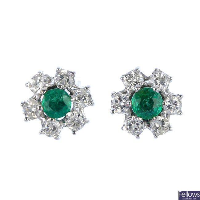 A pair of emerald and diamond ear studs. 