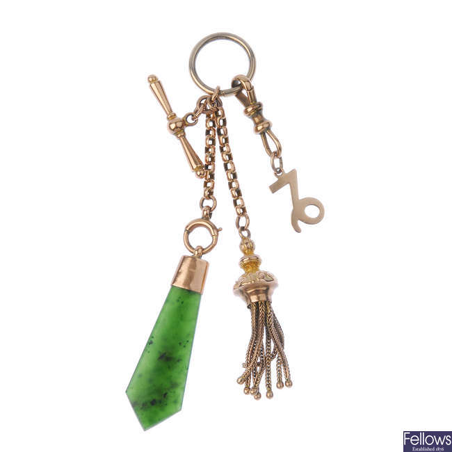 An early 20th century chain attachment, suspending a tassel and pendant.
