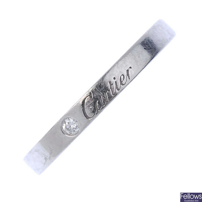 CARTIER - a platinum diamond band ring. 