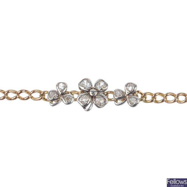 An early 20th century gold diamond clover bracelet.