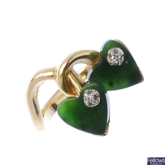 A nephrite jade and diamond dress ring.