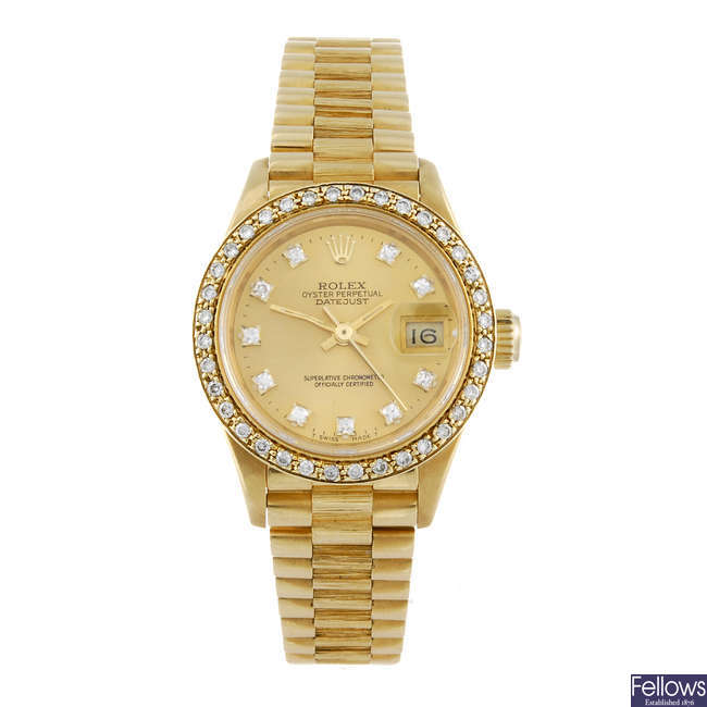 ROLEX - a lady's 18ct yellow gold Oyster Perpetual Datejust bracelet watch.
