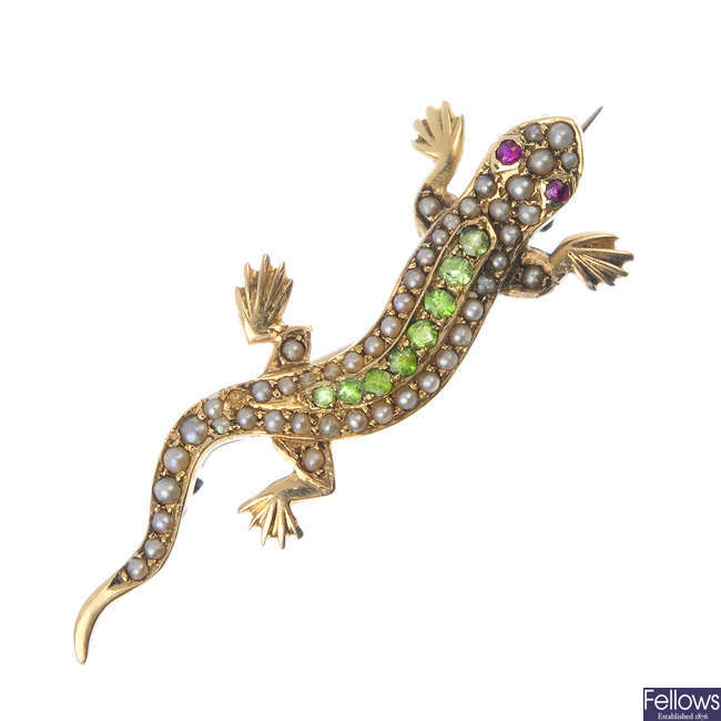 An early 20th century gold, demantoid garnet and split pearl salamander brooch.