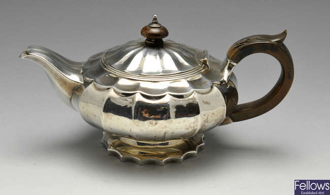 A George IV silver bachelor teapot.