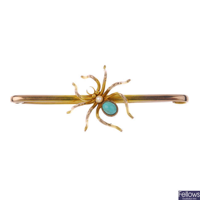 An early 20th century 9ct gold gem-set spider bar brooch.