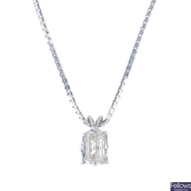 A diamond single-stone pendant. 