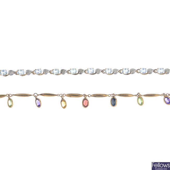 A selection of three gem-set bracelets.