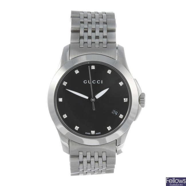 GUCCI - a lady's stainless steel 126.5 bracelet watch.