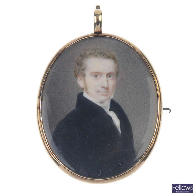 A mid Victorian hand painted portrait miniature mourning brooch. 