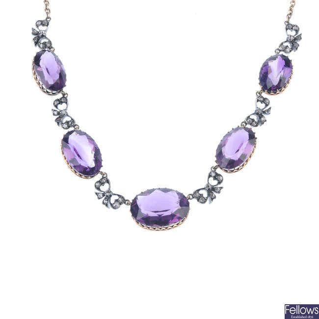 An amethyst and diamond necklace. 