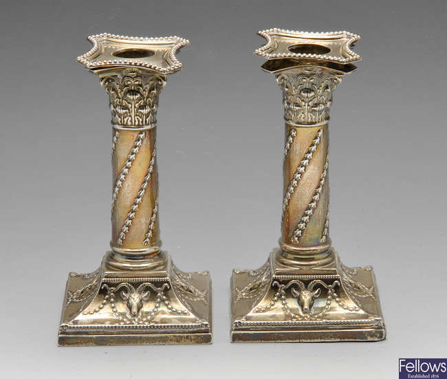 Pair of Victorian silver candlesticks.
