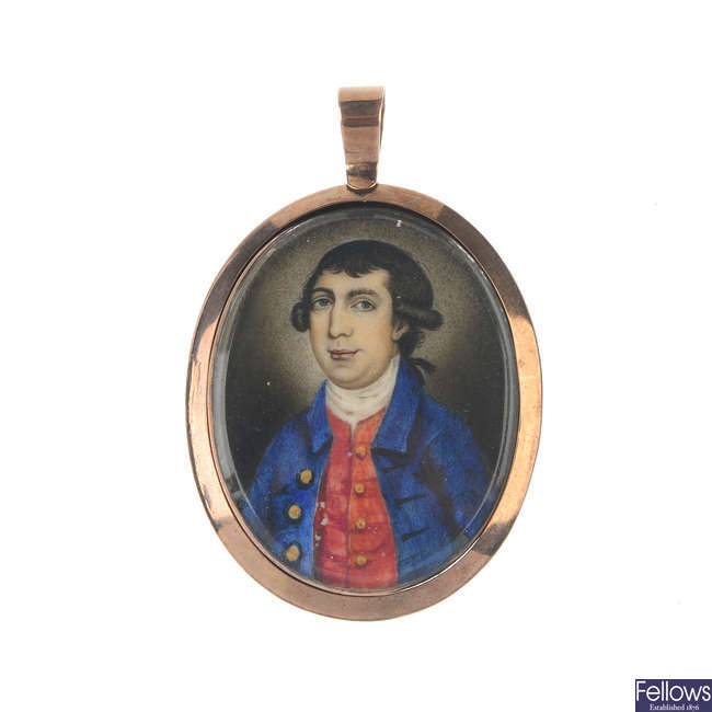 A mid Victorian hand painted miniature memorial pendant.