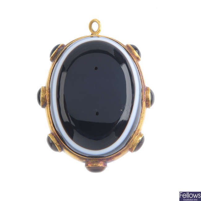 A late Victorian gold banded agate pendant, circa 1880.