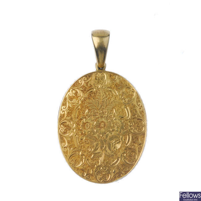 A late 19th century gold photograph pendant.