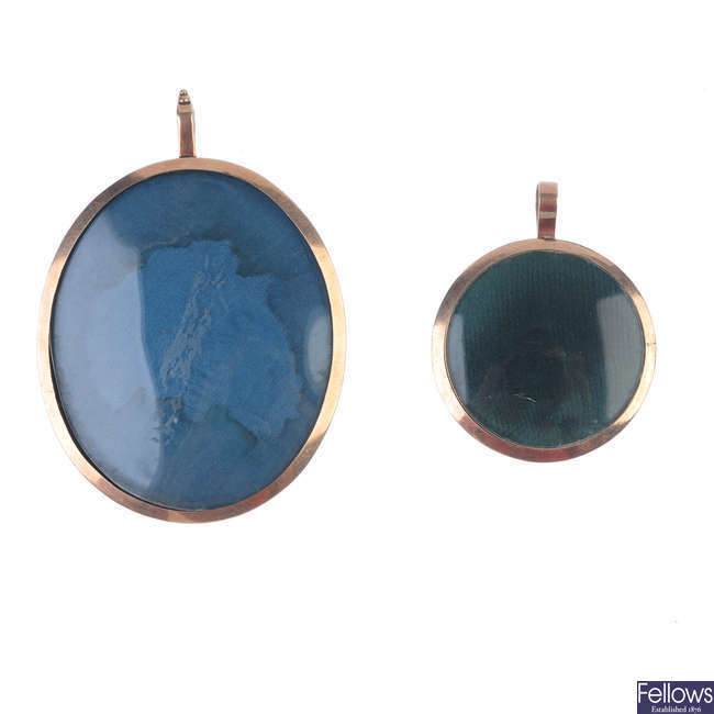 Two late 19th century 9ct gold photograph pendants.