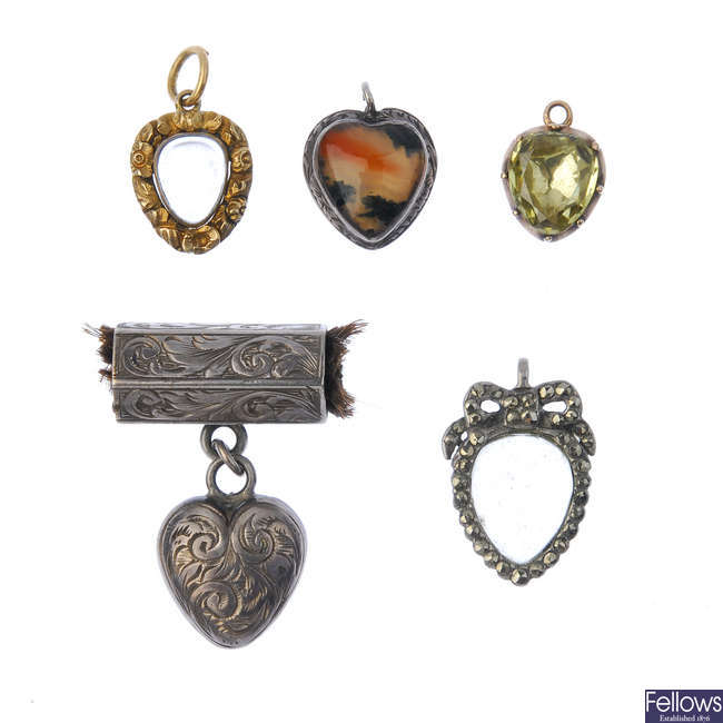 A selection of five heart-shape mid to late Victorian memorial pendants.
