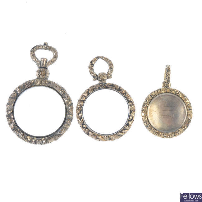 A selection of late 19th century gold plated photograph pendants.