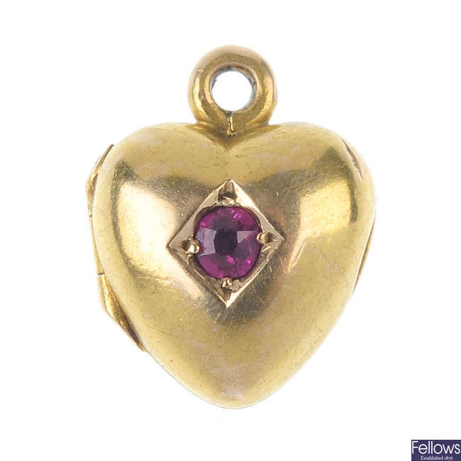 A late 19th century gold ruby heart locket.