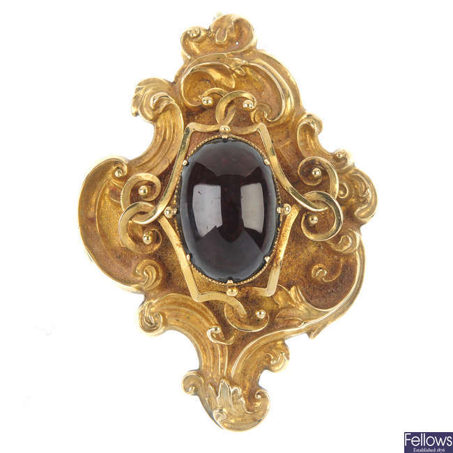 A late 19th century gold and garnet pendant.