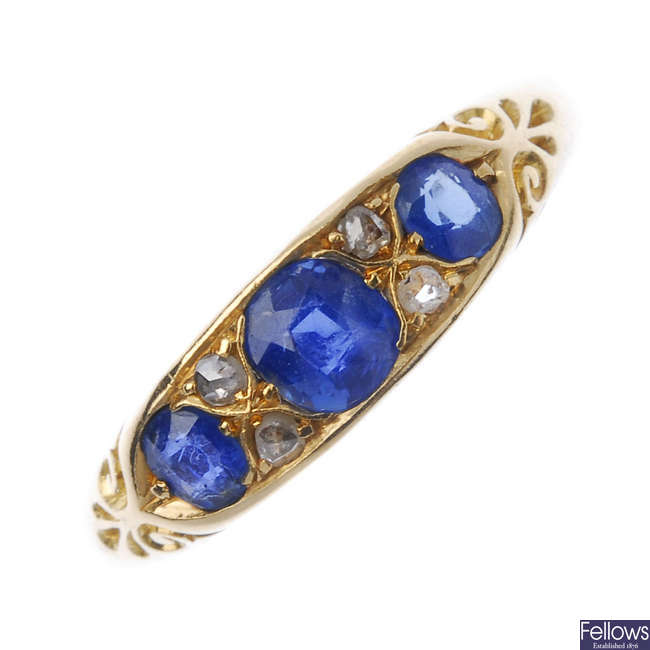 An Edwardian 18ct gold sapphire and diamond ring.