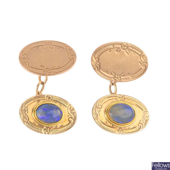 A pair of 9ct gold foil-back opal cufflinks.