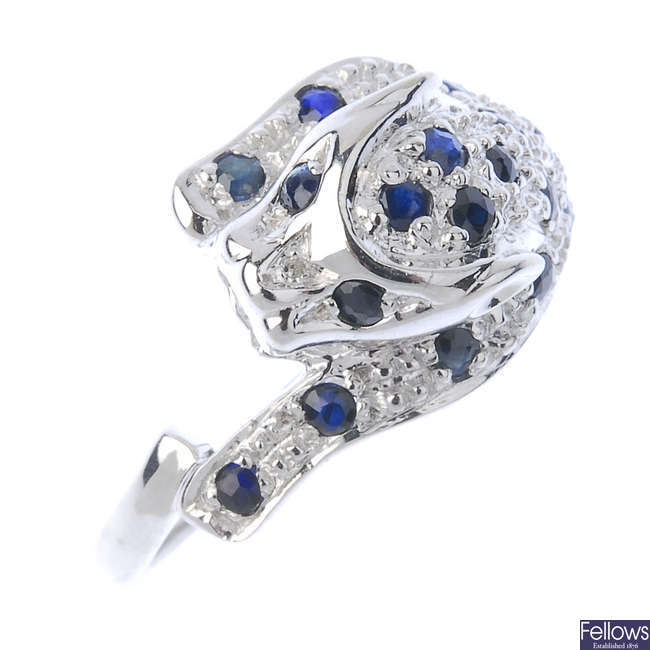 A 9ct gold sapphire and diamond leopard ring.