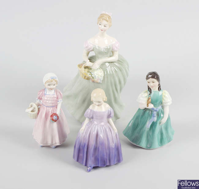  A group of four Royal Doulton figures