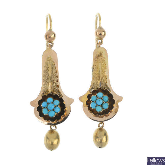 A pair of late 19th century gold turquoise ear pendants.
