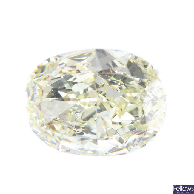 An oval-shape coloured diamond, weighing 1.61ct.