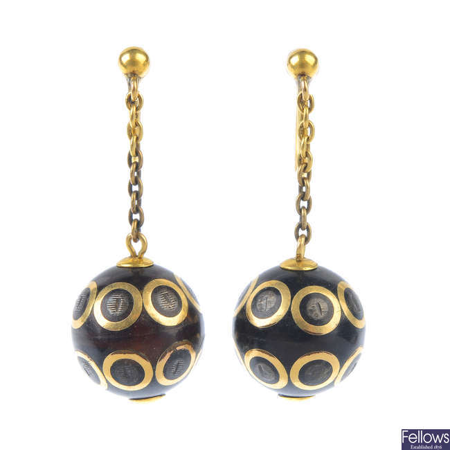 A pair of late 19th century pique earrings.