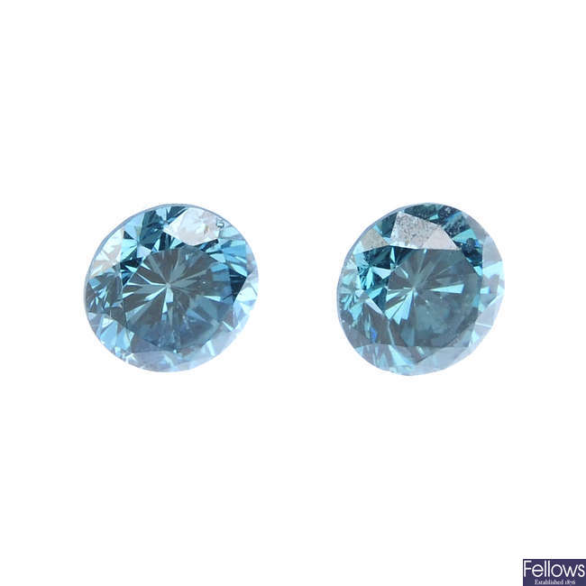 Three brilliant-cut colour treated 'blue' diamonds.
