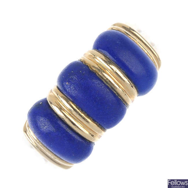 A lapis lazuli three-stone ring.