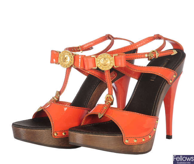 LOUIS VUITTON - a pair of patent orange leather platform sandals. 