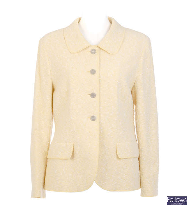 CHANEL - a pale yellow jacket.